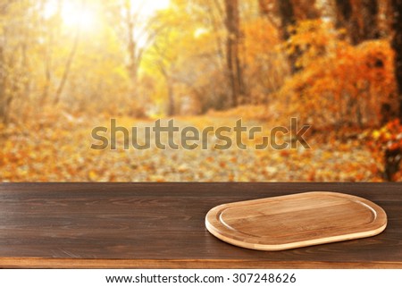 autumn landscape of golden colors of trees in park and kitchen top desk and table space