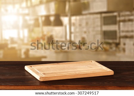 blurred background of kitchen of sun light and kitchen desk