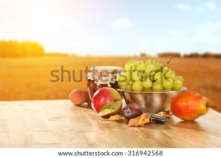 Gold pear on table in landscape