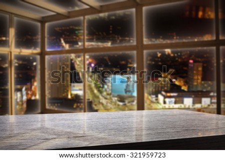 dark interior with window and city landscape at night with free space for your glass
