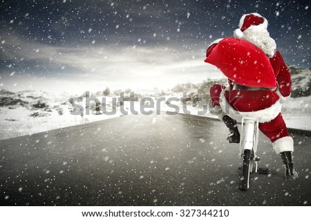 white bike and red santa claus