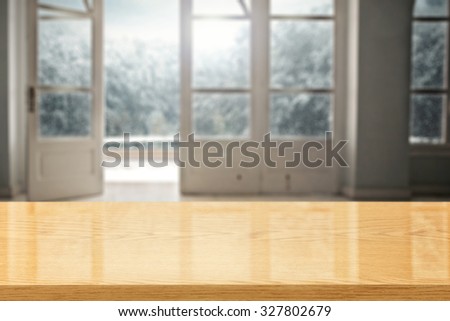 yellow glasses desk space and window and winter landscape