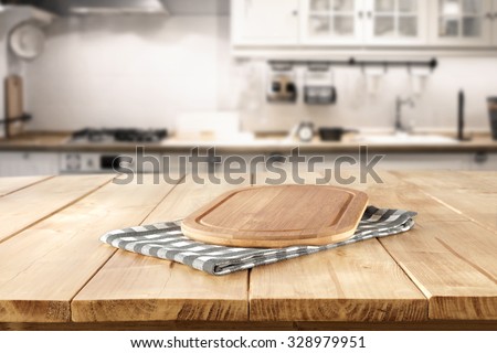blurred background of retro kitchen with brown wooden kitchen desk top