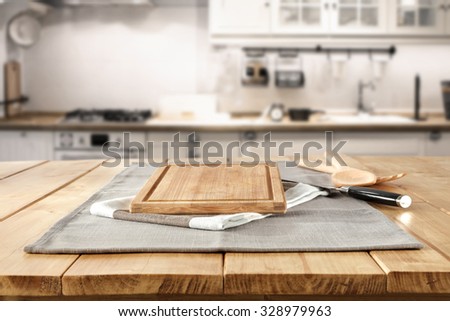 blurred background of retro kitchen with knife and desk