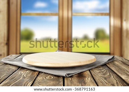 blurred background of brown wooden window space and breakfast wooden table and kitchen desk space