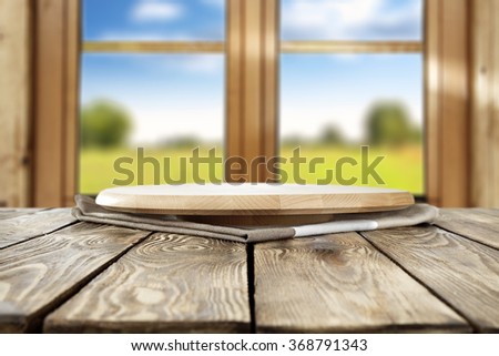 blurred background of brown wooden window space and breakfast time and wooden table