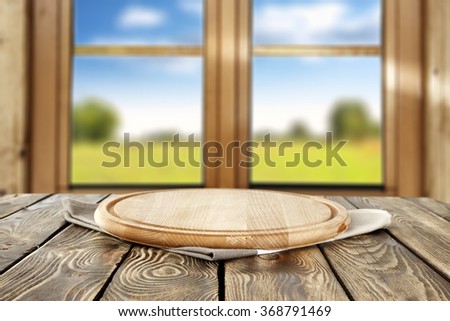 blurred background of brown wooden window space and board of yellow color space