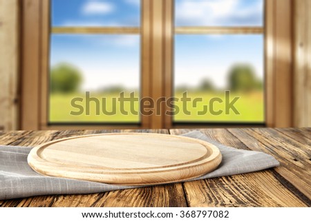 spring wooden window space in blurred background and kitchen board of free space