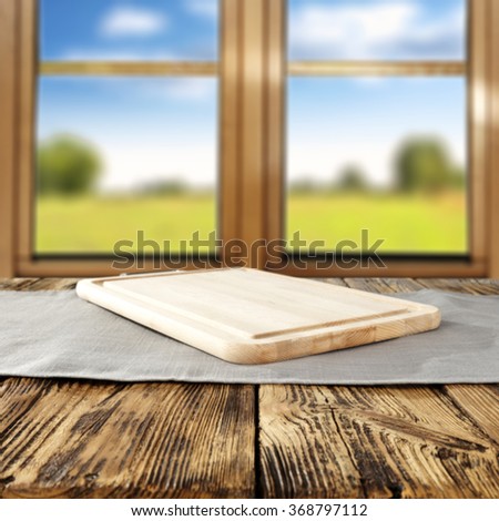 spring wooden window space in blurred background and yellow wooden desk space and space for your glass