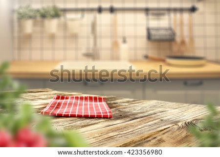 home interior of kitchen in brown colors and red napkin