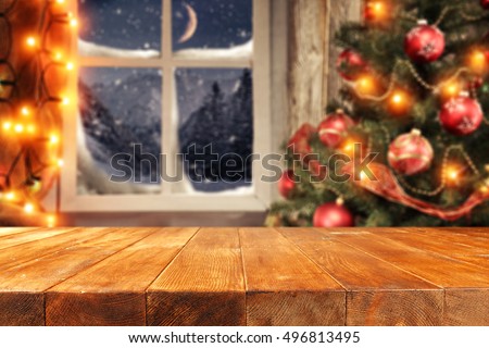 background of xmas time and xmas tree with window of winter