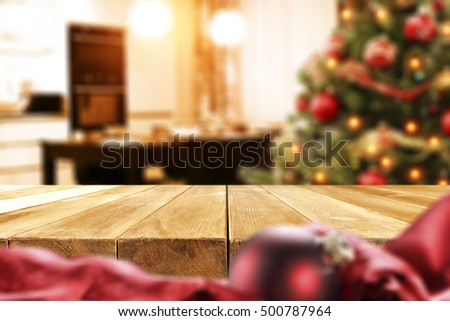 christmas table and xmas tree in kitchen