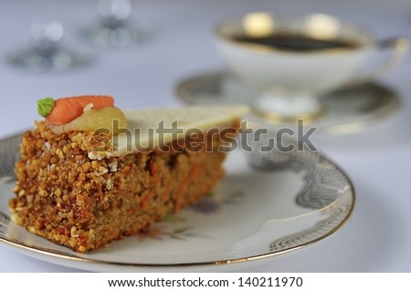 delicious carrot cake with antique coffee set
