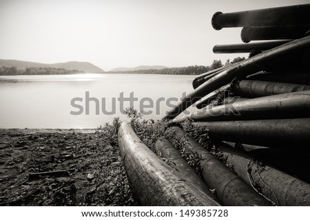Large pipes running into the lake damaging the environment