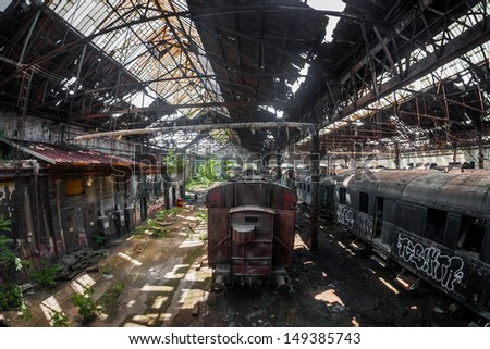 Some trains at abandoned train depot