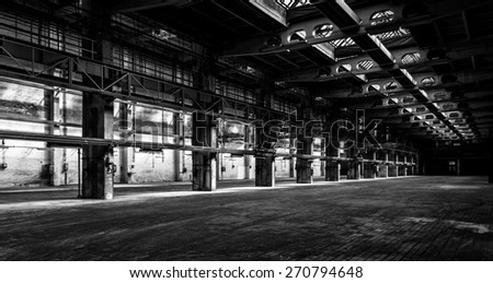 Dark industrial interior of an old building