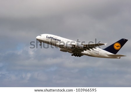 SAN FRANCISCO, CA - MAY 26: A Lufthansa Airbus A380, the world\'s largest passenger jet, takes off in San Francisco, CA on May 26, 2012. The A380 has recently experienced cracks in its wings.