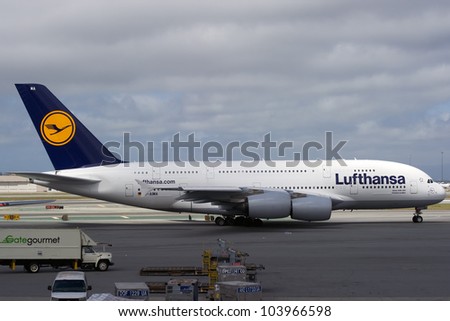 SAN FRANCISCO, CA - MAY 26: A Lufthansa Airbus A380, the world\'s largest passenger jet, taxis in San Francisco, CA on May 26, 2012. The A380 has recently experienced cracks in its wings.