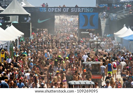 HUNTINGTON BEACH, CA - AUGUST 2: Crowds of surf fans at the Nike US Open of Surfing in Huntington Beach, CA on August 2, 2012