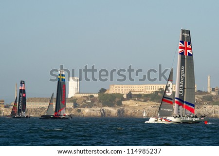 SAN FRANCISCO, CA - OCTOBER 4: The Artemis, Oracle and Ben Ainslie teams sail in front of Alcatraz in the America\'??s Cup World Series sailing races in San Francisco, CA on October 4, 2012