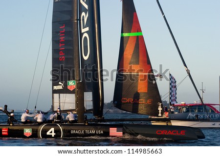 SAN FRANCISCO, CA - OCTOBER 4: Oracle Team USA skippered by James Spithill crosses the finish line in the America\'s Cup World Series sailing races in San Francisco, CA on October 4, 2012