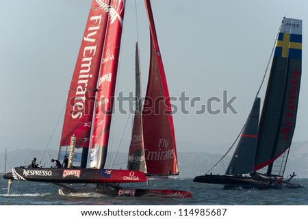 SAN FRANCISCO, CA - OCTOBER 4: Sweden\'s Artemis Red and Emirates Team New Zealand competes in the America\'??s Cup World Series sailing races in San Francisco, CA on October 4, 2012