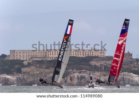 SAN FRANCISCO, CA - OCTOBER 4: The Energy Team and Emirates Team New Zealand compete in the America'??s Cup World Series sailing races in San Francisco, CA on October 4, 2012