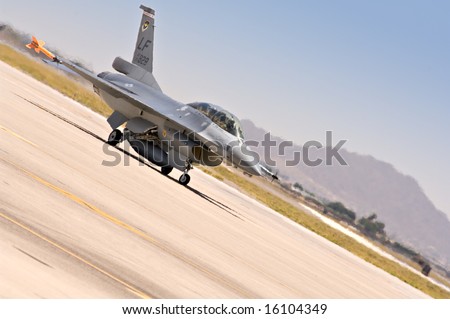 F-16 fighter jet taxis before takeoff at Luke Air Force Base