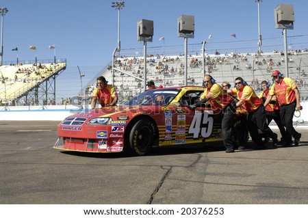 AVONDALE, AZ - NOV 7 -  Kyle Petty\'s (45) pit crew pushes his car at the NASCAR Sprint Cup series race at Phoenix International Raceway