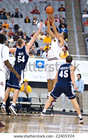 GLENDALE, AZ - DECEMBER 20: Jeff Pendergraph #4 of Arizona State Univerity shoots over Chris Miles #54 of Brigham Young University in the basketball game on December 20, 2008 in Glendale, Arizona.