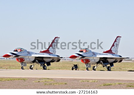 GLENDALE, AZ - MARCH 21: Two U.S. Air Force Thunderbird F-16 aircraft on the runway at the biennial air show (\