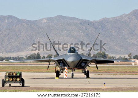 GLENDALE, AZ - MARCH 21: A U.S. Air Force F-22 Raptor fighter parked on the runway at the biennial air show (\