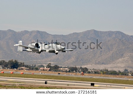 GLENDALE, AZ - MARCH 21: A U.S. Air Force A-10 Thunderbolt makes a low altitude pass at the biennial air show (\