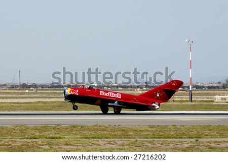 GLENDALE, AZ - MARCH 21: Bill Reesman lands a Russian MiG-17 at the biennial air show (\
