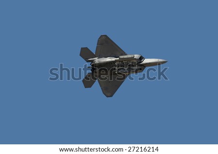 GLENDALE, AZ - MARCH 21: A U.S. Air Force F-22 Raptor makes a pass with its bomb bay open at the biennial air show (\