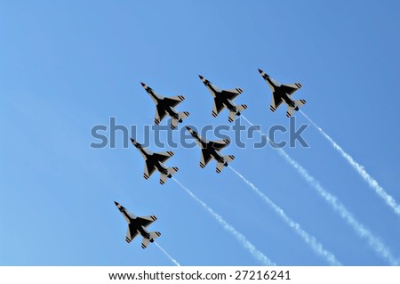 GLENDALE, AZ - MARCH 21: The U.S. Air Force Thunderbirds fly in formation at the biennial air show (\