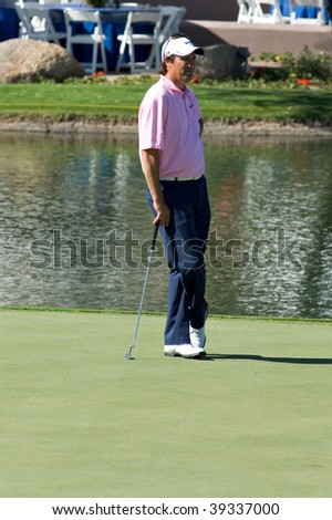 SCOTTSDALE, AZ - OCTOBER 21: Stephen Ames waits to putt in the Frys.com Open PGA golf tournament on October 21, 2009 in Scottsdale, Arizona.