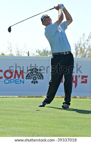 SCOTTSDALE, AZ - OCTOBER 21: Tom Lehman hits a drive in the Frys.com Open PGA golf tournament on October 21, 2009 in Scottsdale, Arizona.