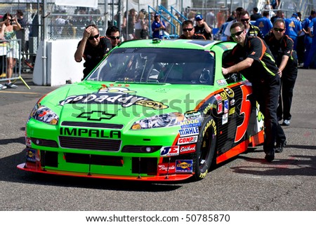 AVONDALE, AZ - APRIL 10: The pit crew pushes the #5 GoDaddy.com Chevrolet car, driven by Mark Martin, onto the track before the start of the Subway Fresh Fit 600 on April 10, 2010 in Avondale, AZ.