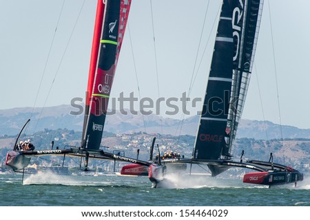 San Francisco, Ca - September 12: Emirates Team New Zealand And Oracle Team Usa Compete In The America'S Cup Sailing Races In San Francisco, Ca On September 12, 2013