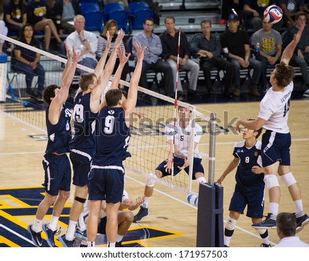 IRVINE, CA - JANUARY 17: The University of California Irvine\'s Jeremy Dejno spikes the ball in a volleyball match with Brigham Young University at the Bren Center in Irvine, CA on January 17, 2014