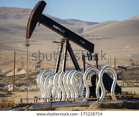 Kern County, California - November 26, 2013: Pumpjacks Extract Oil From An Oilfield In Kern County, Ca. About 15 Billion Barrels Of Oil Could Be Extracted Using Hydraulic Fracturing In California.