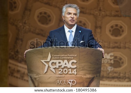 NATIONAL HARBOR, MD - MARCH 7, 2014: Al Cardenas, lobbyist and chairmen of the American Conservative Union, speaks at the Conservative Political Action Conference (CPAC).