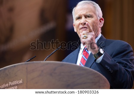 NATIONAL HARBOR, MD - MARCH 7, 2014: Political commentator Lieutenant Colonel Oliver North speaks at the Conservative Political Action Conference (CPAC).