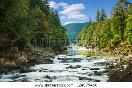 mountain river with waterfall