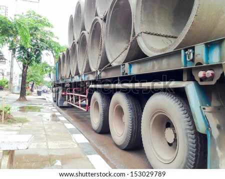 concrete pipes on the truck stop at the rode side