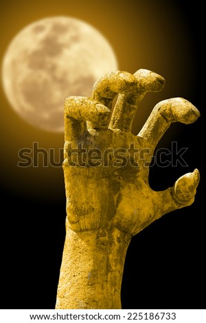 evil hand with full moon background