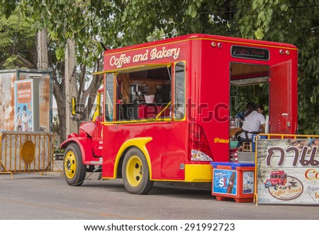 PHITSANULOKE, THAILAND - MAY 3 : Mobile coffee shop (coffee truck) park and service at parking zone in front of Watmahathat temple on May 3 , 2013 at Phitsanuloke Thailand.