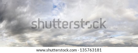 XXXL Clear grey sky and clouds background panorama. Very high resolution, multi-frame composite.
