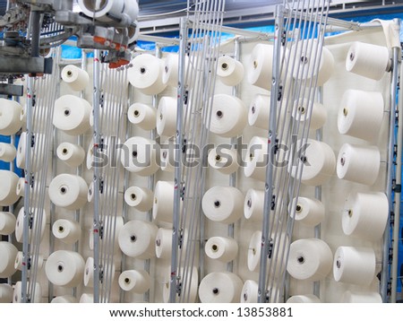 Cotton yarn spools (bobbins) in a textile factory